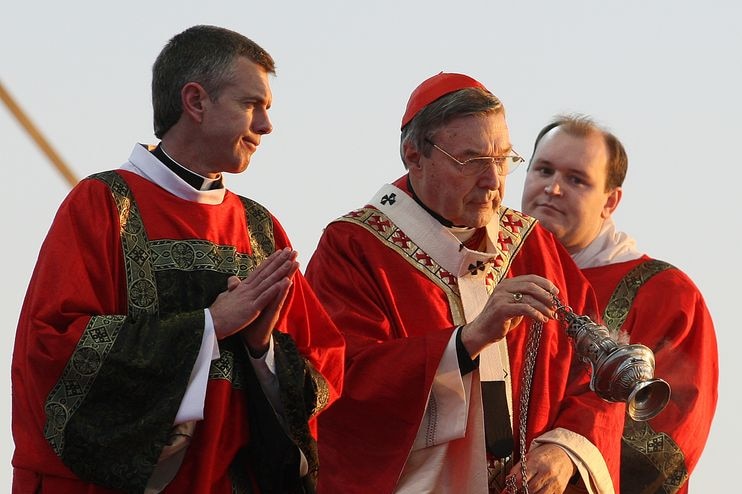 'Genuine sorrow': Cardinal George Pell (C) during World Youth Day celebrations