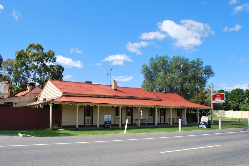 A country pub with a red roof.