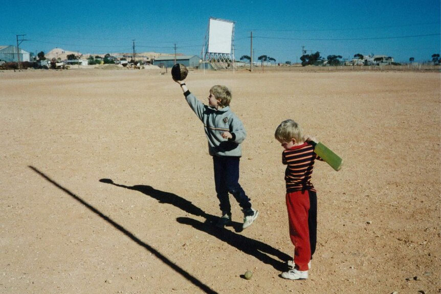 Tom and his brother - an attempt at desert cricket