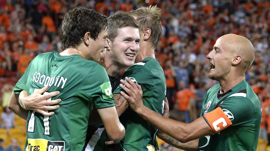 Joey Gibbs celebrates sealing Newcastle's 2-0 win over Brisbane