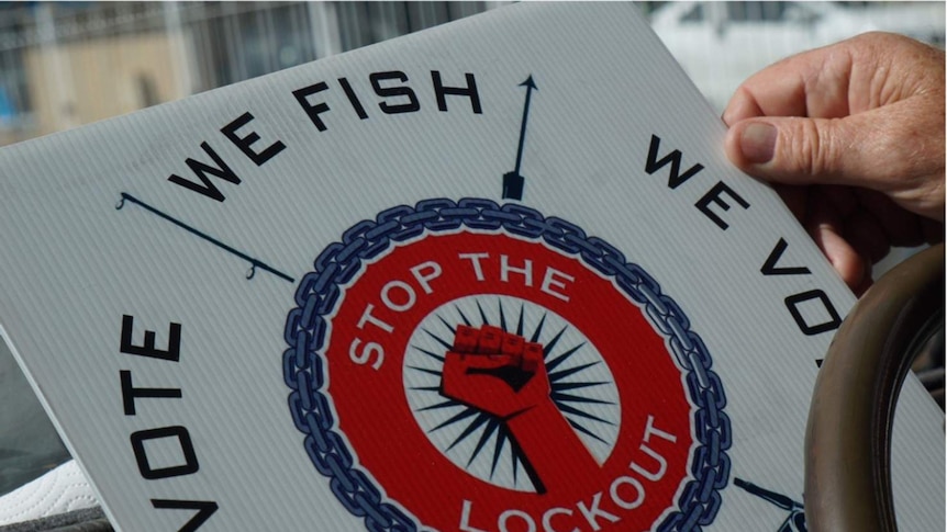 Sign that reads 'Stop the Lockout': We Fish, We Vote'