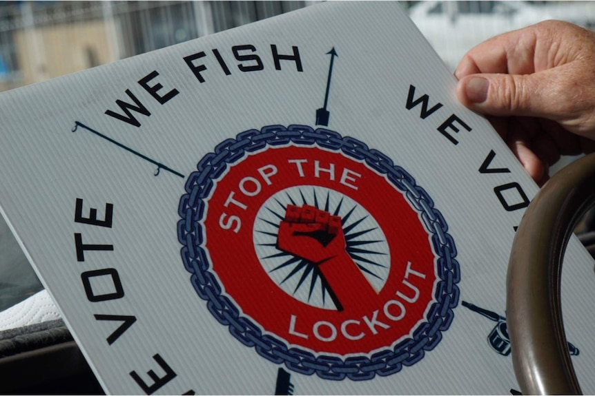 Sign that reads 'Stop the Lockout': We Fish, We Vote'