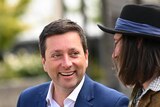 Victorian Opposition leader Matthew Guy speaks with people at Sovereign Hill.