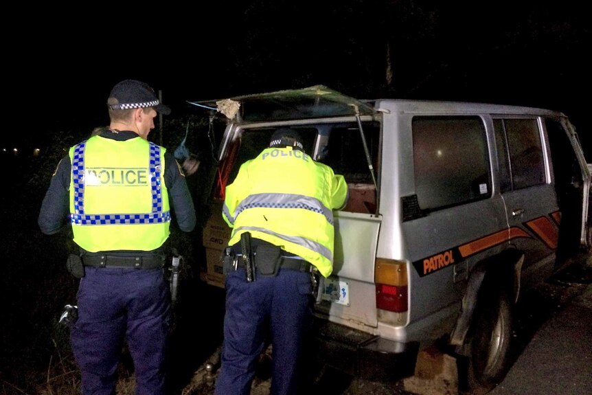 Tasmania Police inspect a vehicle at Rocherlea as part of Operation Lockdown