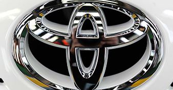 The Toyota logo on a car.