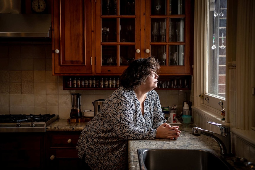 Shani May looks out the window of her Sydney home.