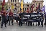 Bus drivers and union representatives rally over driver safety in Brisbane.