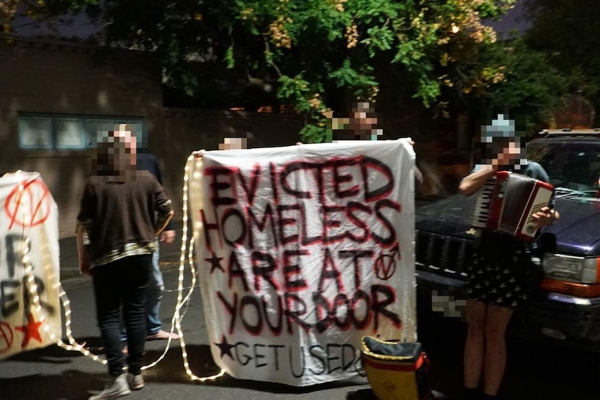 Evicted homeless are at your door banner outside Lord Mayor Robert Doyle's Melbourne home.
