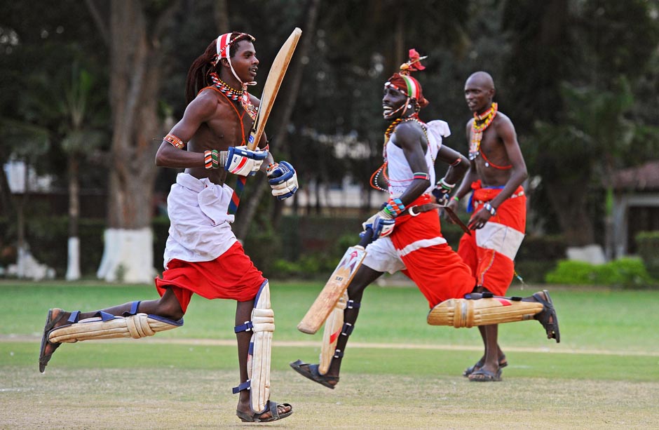 Players in the Maasai Warriors cricket team embark on a run.