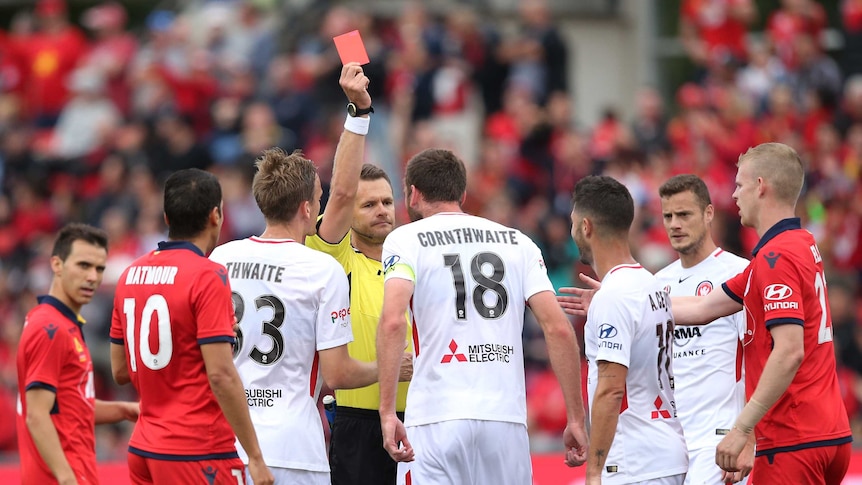 Robert Cornthwaite of Western Sydney Wanderers FC gets a red card against Adelaide United.