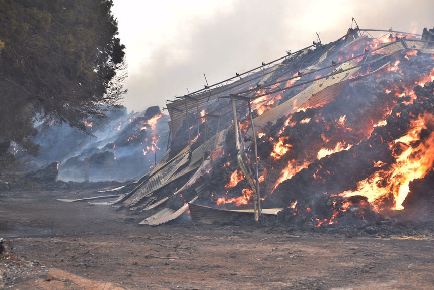 Hay storage shed burns