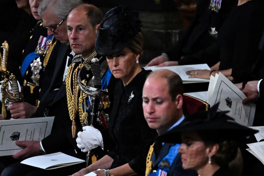Prince William and Princess Catherine appear to cry at Queen Elizabeth II's funeral. 