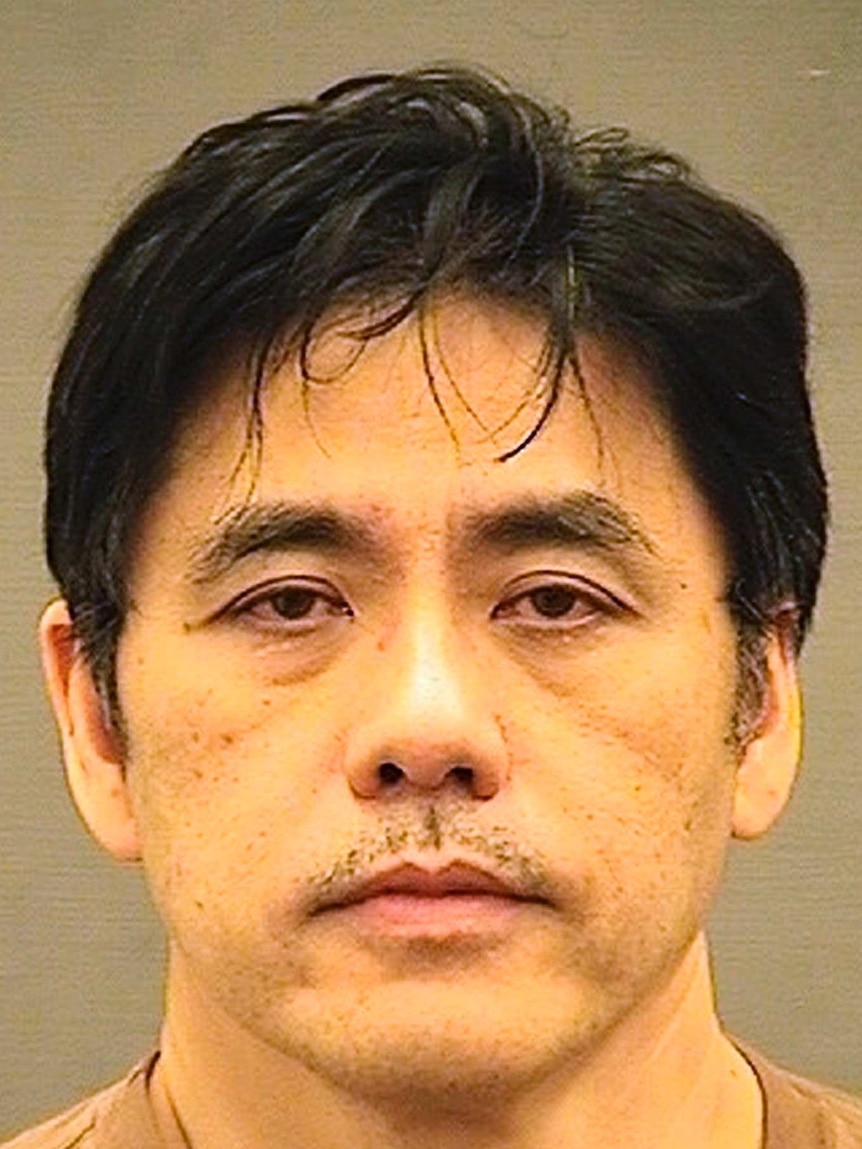 A mug shot of male former CIA Jerry Chun Shing Lee.