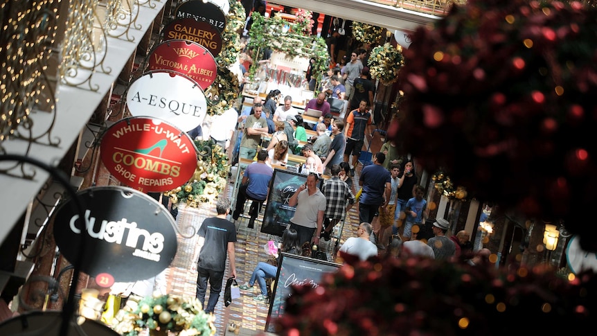 Shoppers are pictured in the Sydney CBD on Christmas Eve 2015