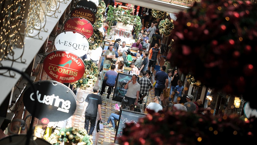 Shoppers are pictured in the Sydney CBD on Christmas eve 2015.