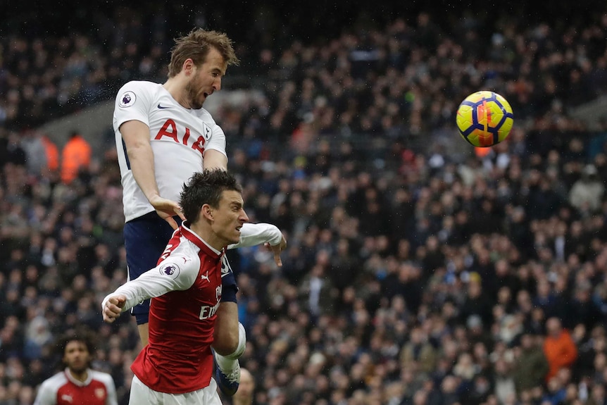 Harry Kane scores against Arsenal