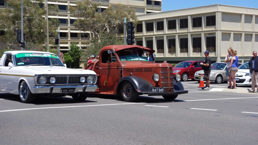 Cars taking part in the Summernats Citycruise in Canberra.