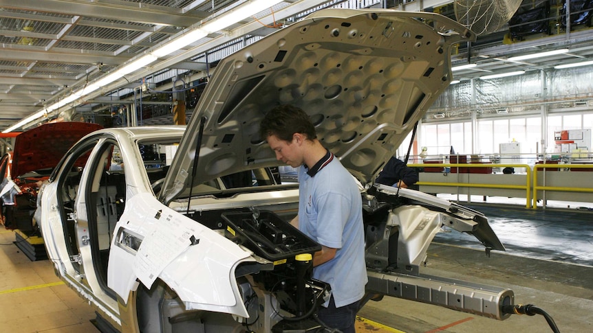 Holden worker assembles car