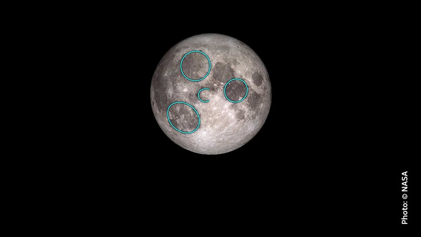 Image of the moon with blue highlights showing the northern hemisphere 'man in the moon'