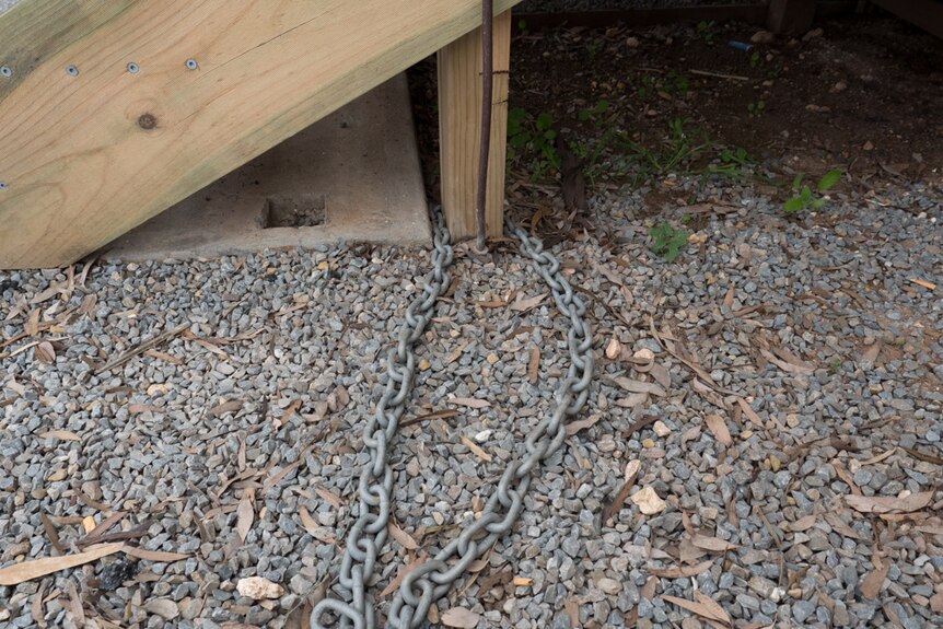 The chain cut by thieves to steal the container from the SES site.