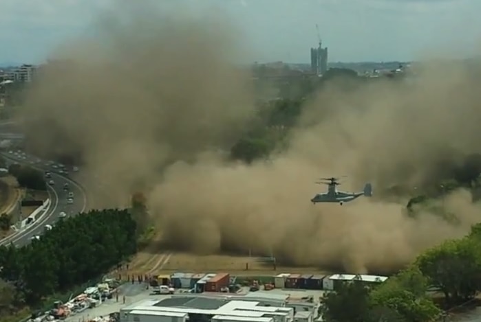 US Osprey aircraft create a dust cloud in Brisbane