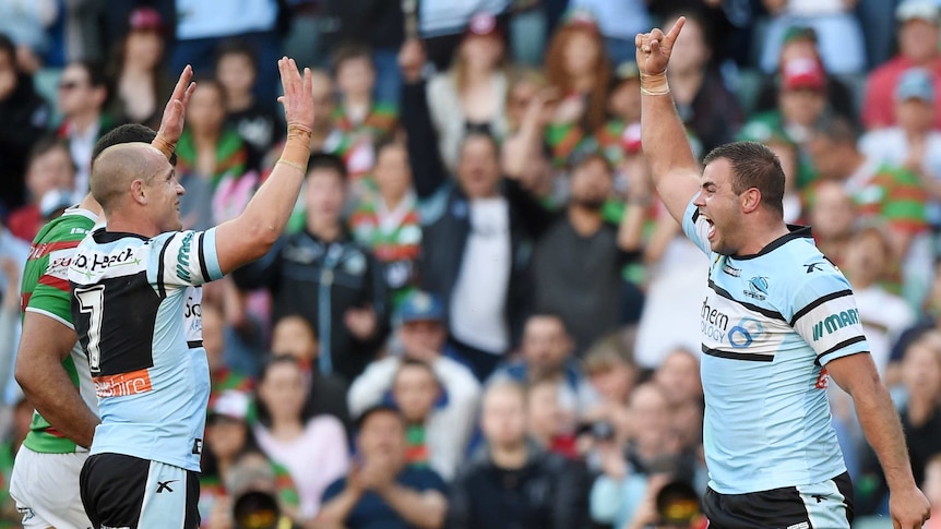 Wade Graham celebrates a try for the Sharks against Souths