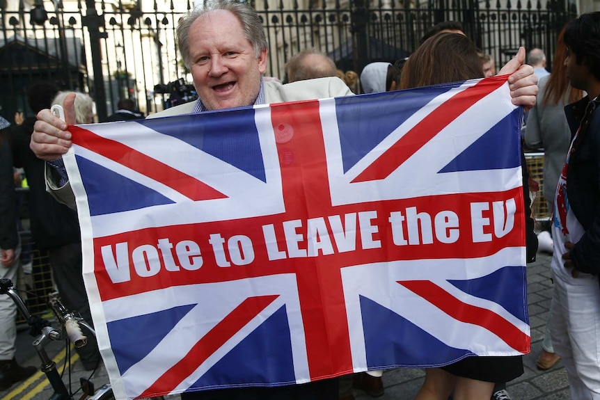 Man holding Leave flag