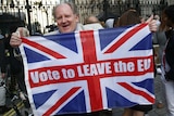 Man holding Leave flag