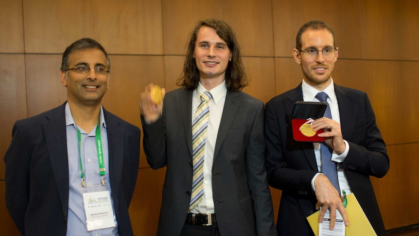 Alessio Figalli, Peter Scholze and Akshay Venkatesh, pose for a photo.