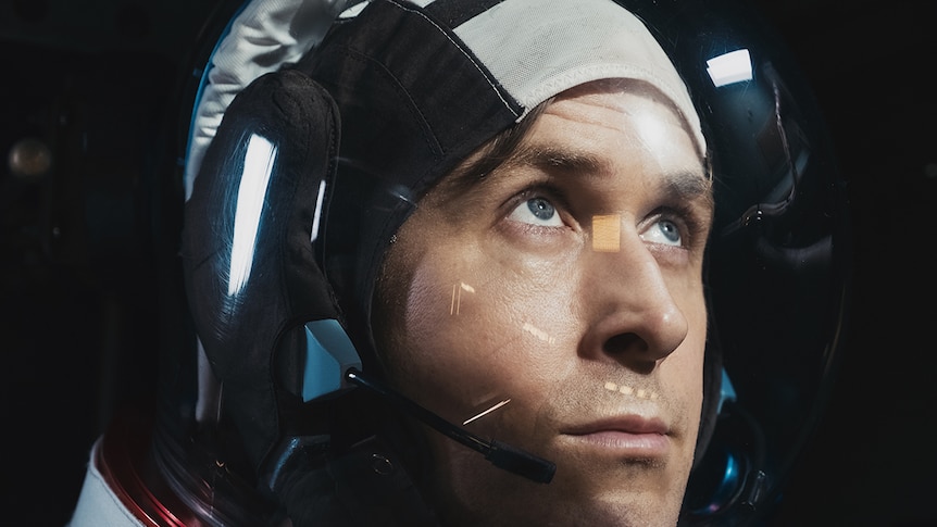Mid-shot of Ryan Gosling as American astronaut Neil Armstrong in 2018 film First Man.