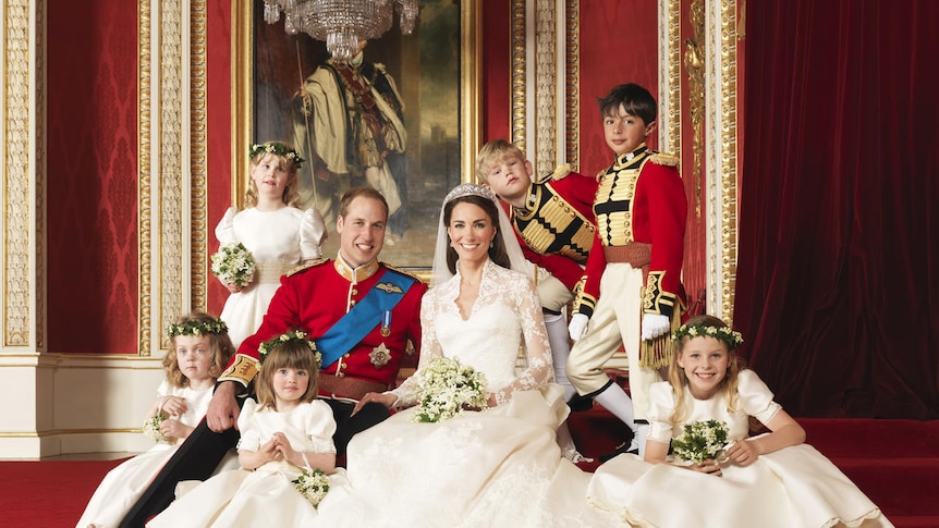 Official photo of the royal couple posing with their pageboys and bridesmaids