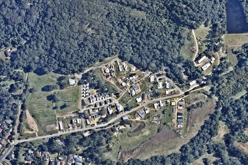 An aerial shot showing Narara Ecovillage surrounded by bushland. 