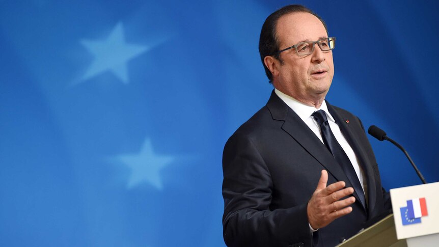 French President Francois Hollande gives a press conference.