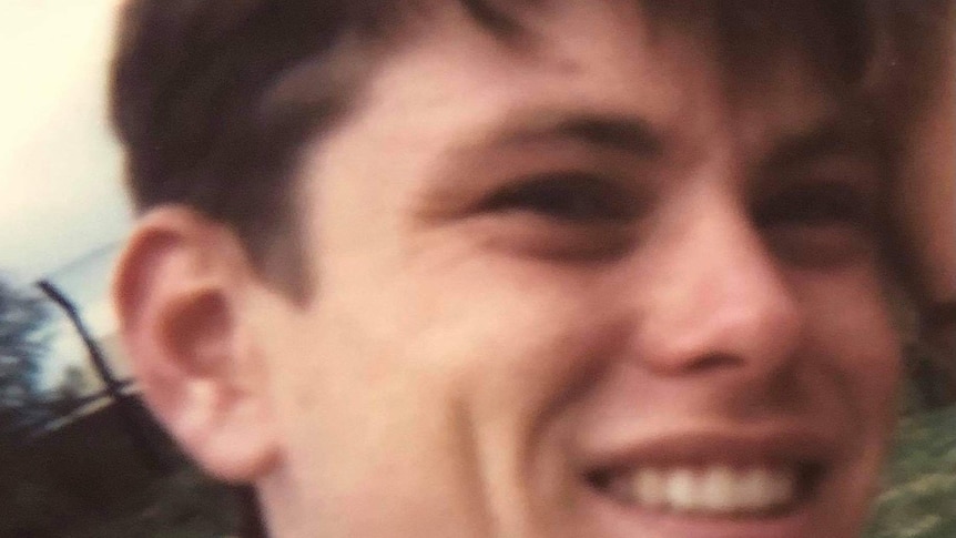 A close up photo of a man's face