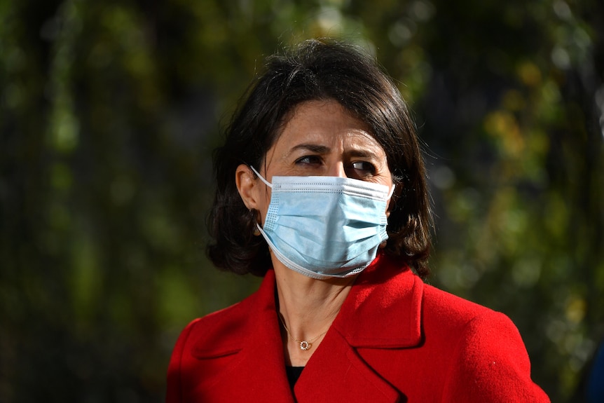 NSW Premier Gladys Berejiklian wears a mask.