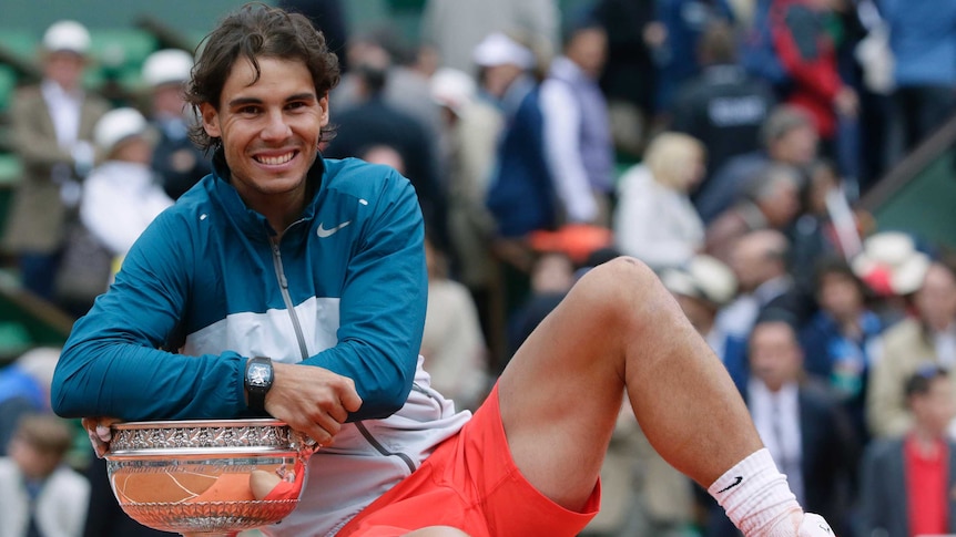 Nadal poses with French Open trophy