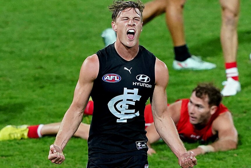Jack Newnes of the Blues reacts after kicking a goal.