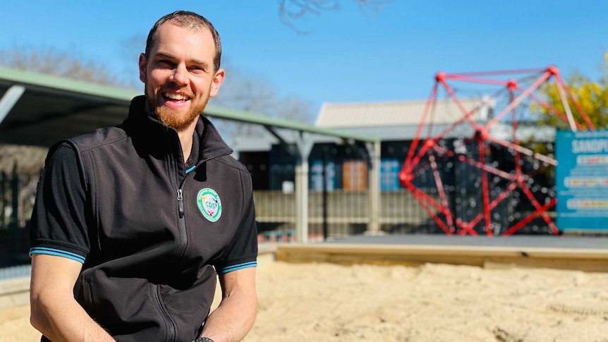 Rob Lans beside the sandpit