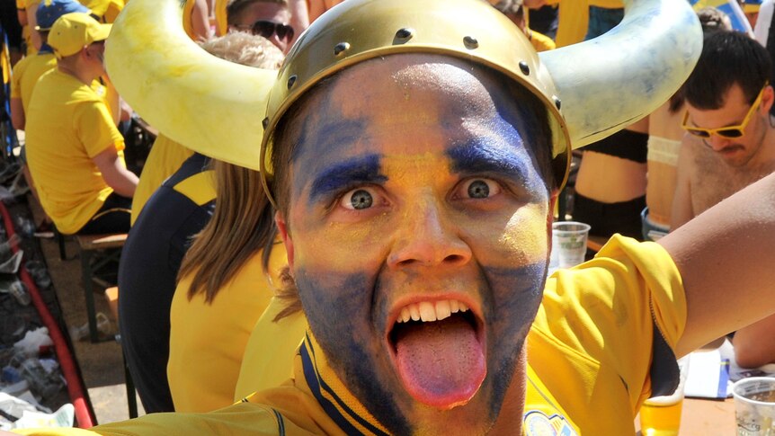 A Swedish fan shows his support in a fan zone in Kiev during Euro 2012.