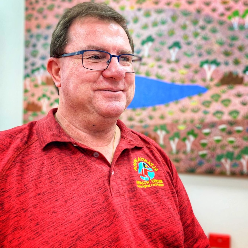 David Smith sits in his office at the Ampilatwatja Health Centre.