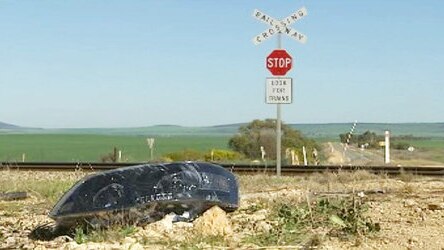 Wreckage at scene of a level crossing smash