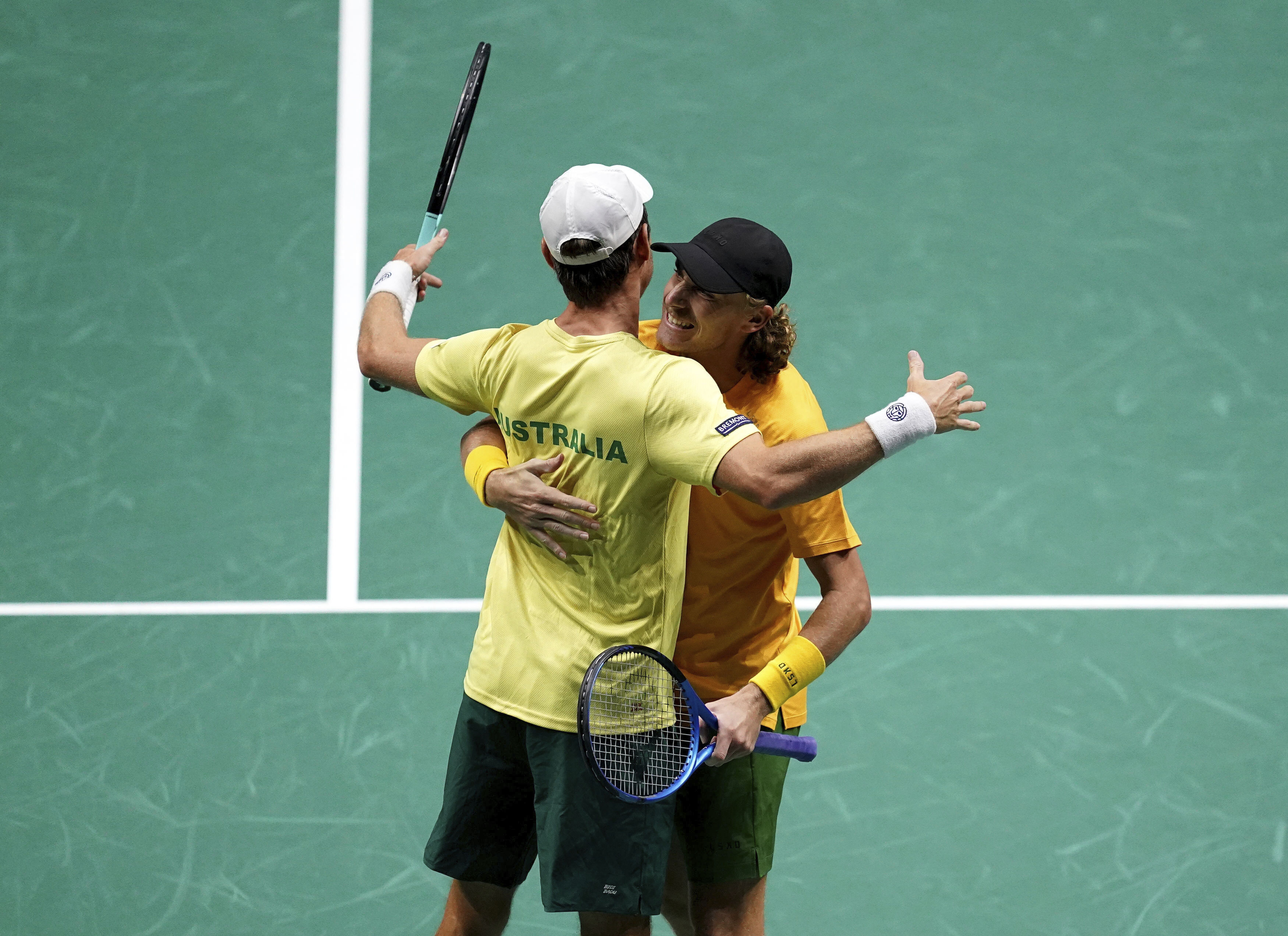 Matthew Ebden and Daniel Purcell hug