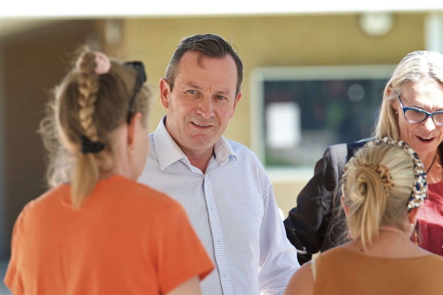 Premier Mark McGowan talks with voters in a final campaign stop in Zac Kirkup's ultra-marginal seat of Dawesville.