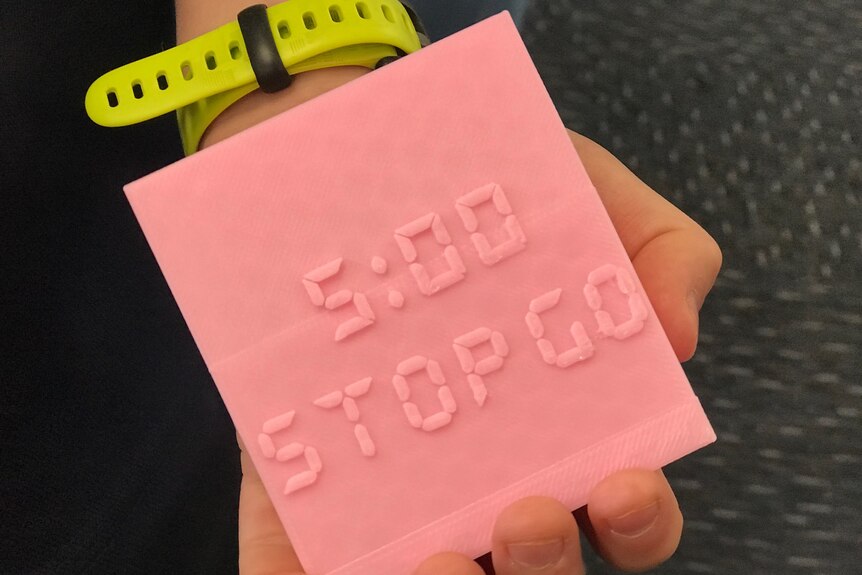 A pink block that says 5:00 STOP, GO