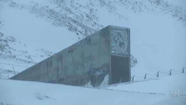 The Doomsday Vault entrance pokes out of the snowy landscape