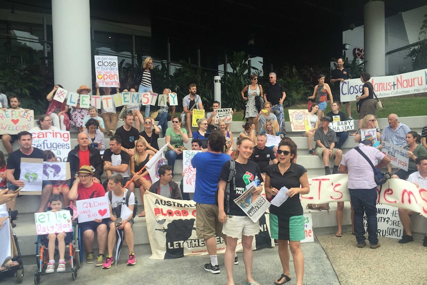 Protesters gathered outside Lady Cilento Children's Hospital