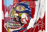 Jean-Michel Basquiat’s painting, In This Case, depicts a skull on a red background.