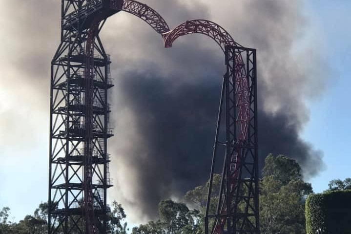 Smoke rises from the scene of the Big Brother house fire