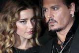 Amber Heard and Johnn Depp at a film premiere.