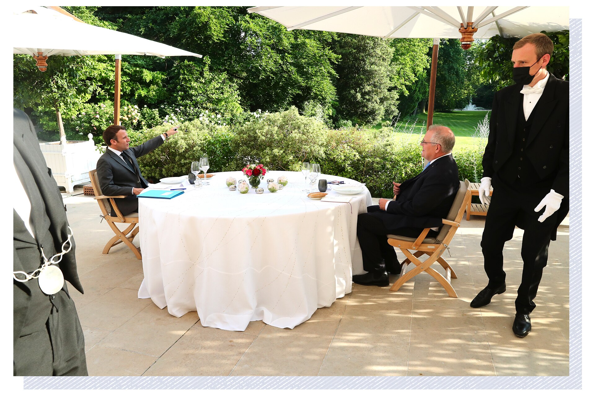 Two men sitting at a table.